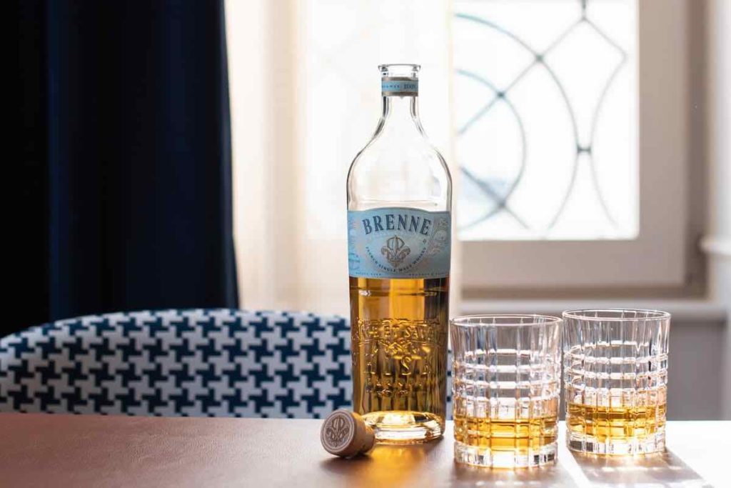 brenne french whisky with two glasses