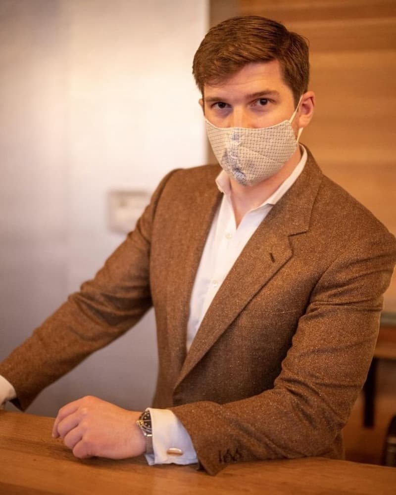 boston bartender Ben Watts in brown jacket and facemask