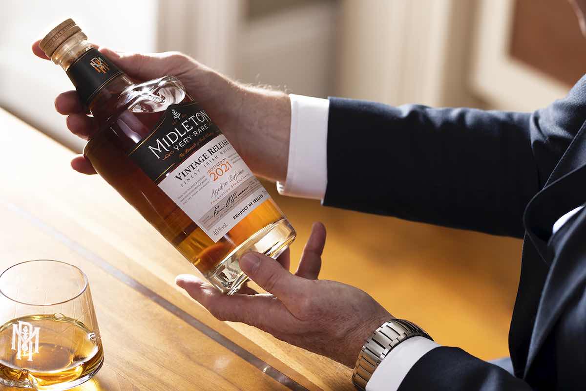 distiller kevin o'gorman holds a bottle of midleton 2021 very rare irish whiskey