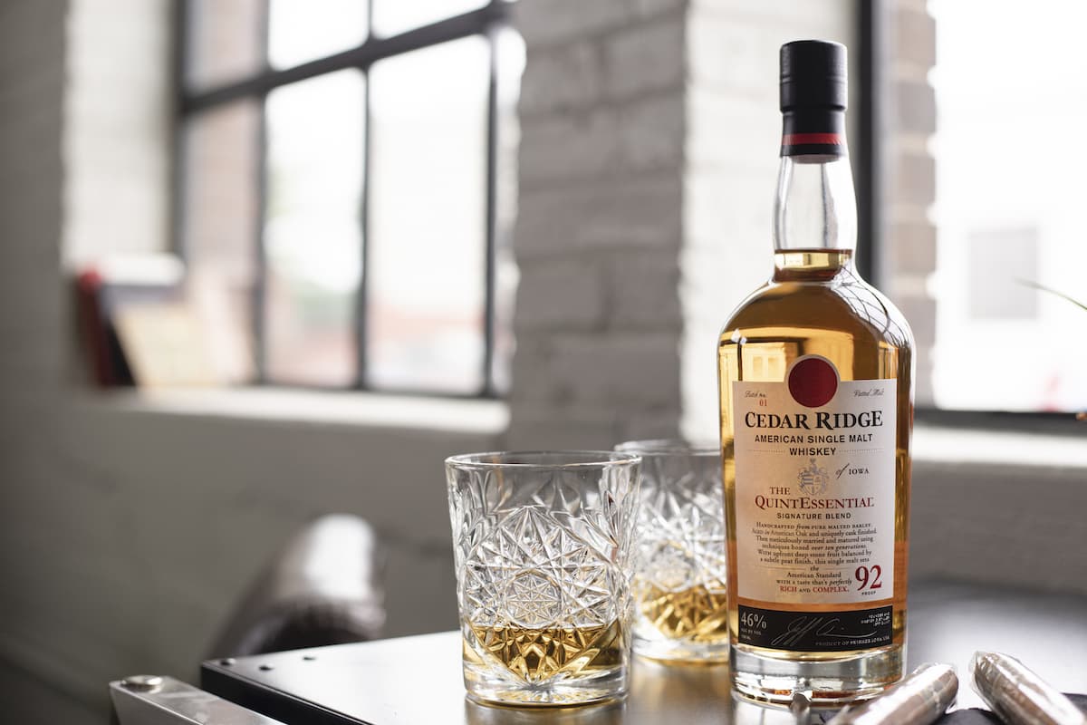 cedar ridge quintessential single malt whiskey with two glasses