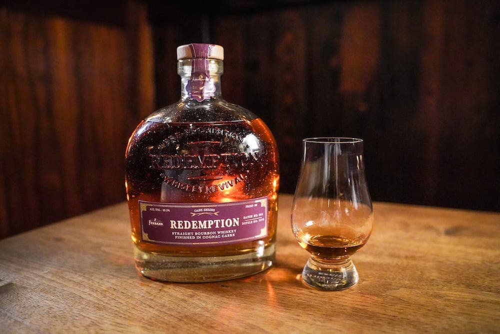 Redemption Cognac Cask Finish bourbon with glass