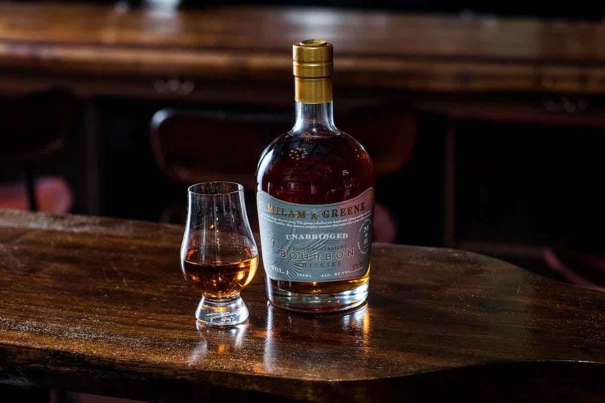 bottle of Milam & Greene Unabridged Volume 1 bourbon