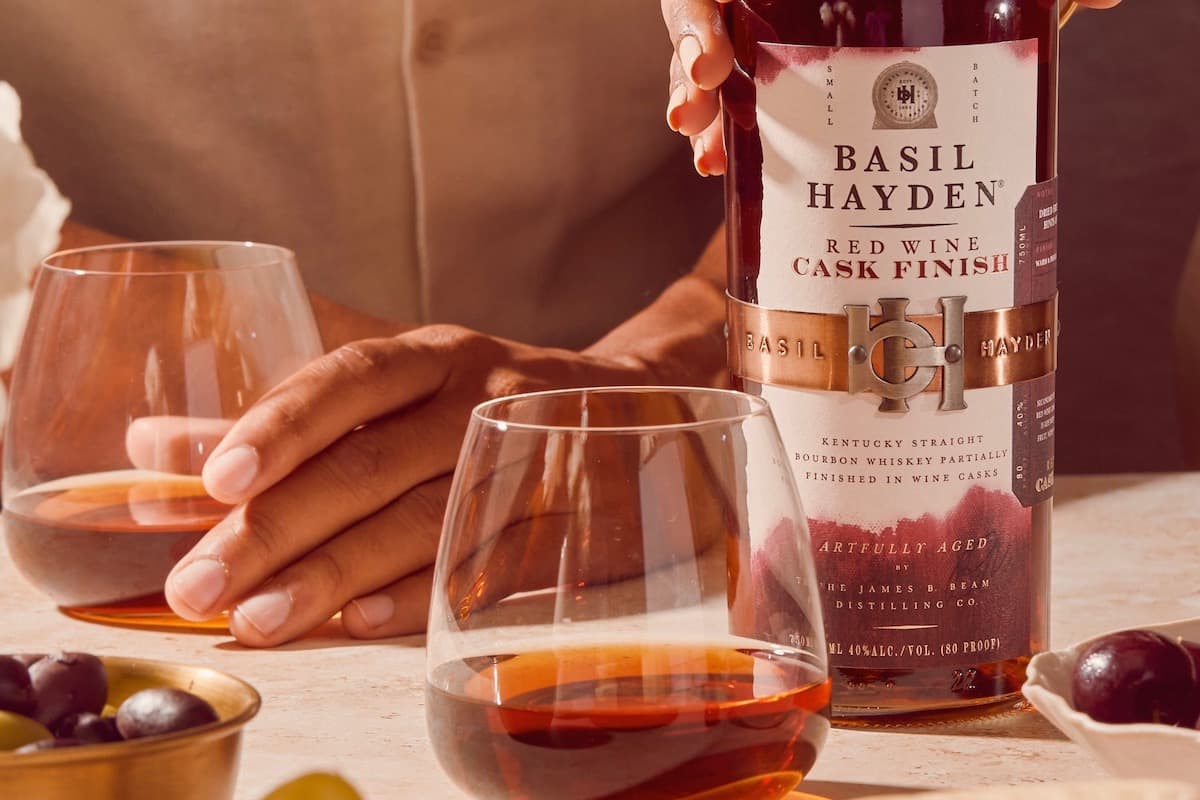 Basil Hayden Red Wine Cask Finish bourbon with glasses