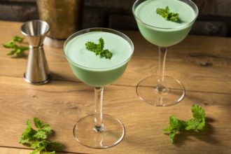 two green-colored grasshopper cocktails