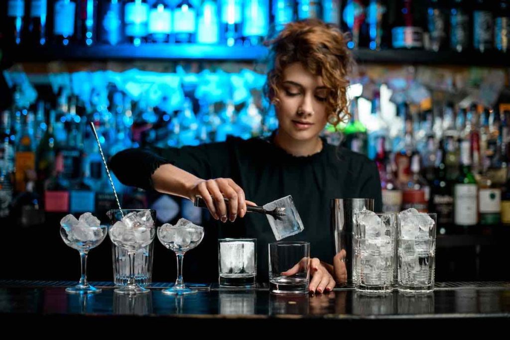bartender with ice cubes