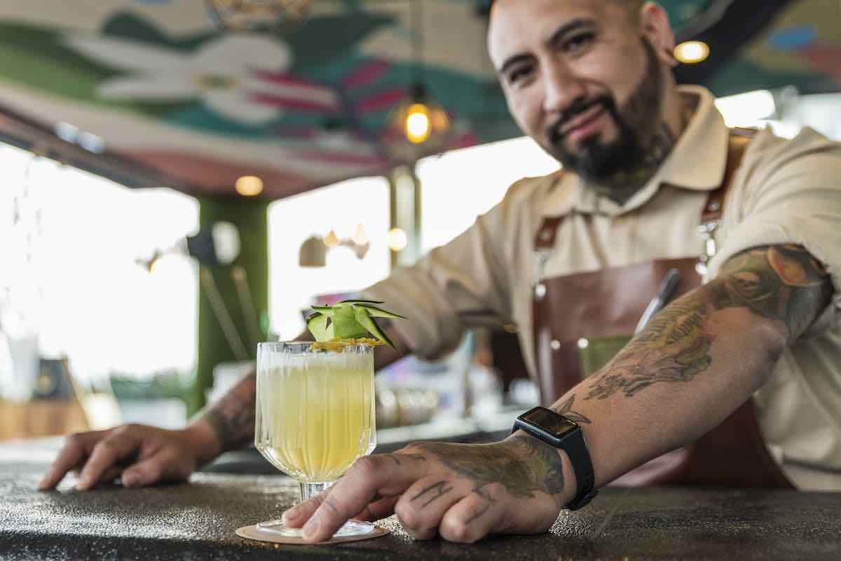 bartender rocco luna serves the pechuga mezcal cocktail at andaz mexico city