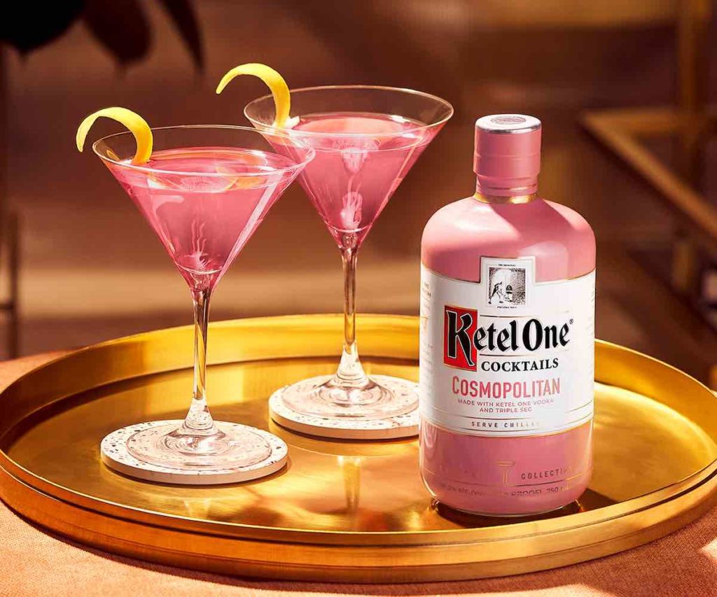 cosmopolitan bottle with two pink cosmo cocktails